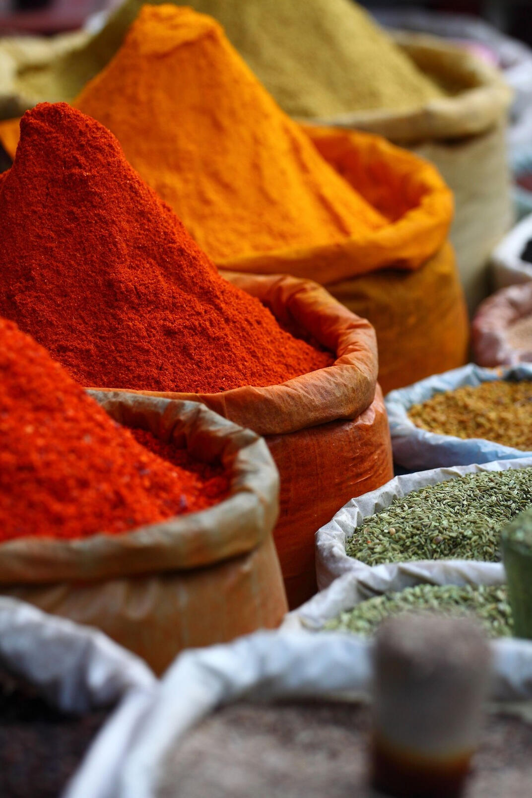 Moroccan spices Colorful ground spices in a Moroccan tray, Ras el Hanout. chefmoulay.org