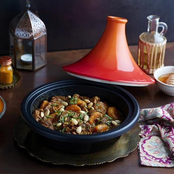 Traditional Moroccan tagine with apricots and almonds in a tagine dish. chefmoulay.org